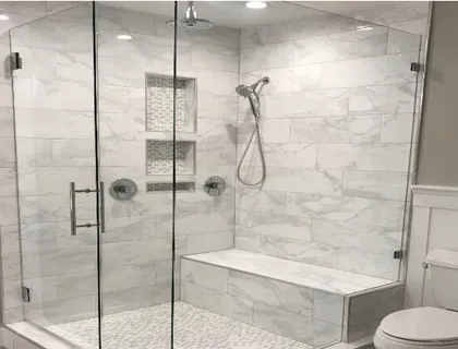 Bathroom remodel with double vanity and bright tile