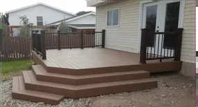 New composite deck with black metal railing
